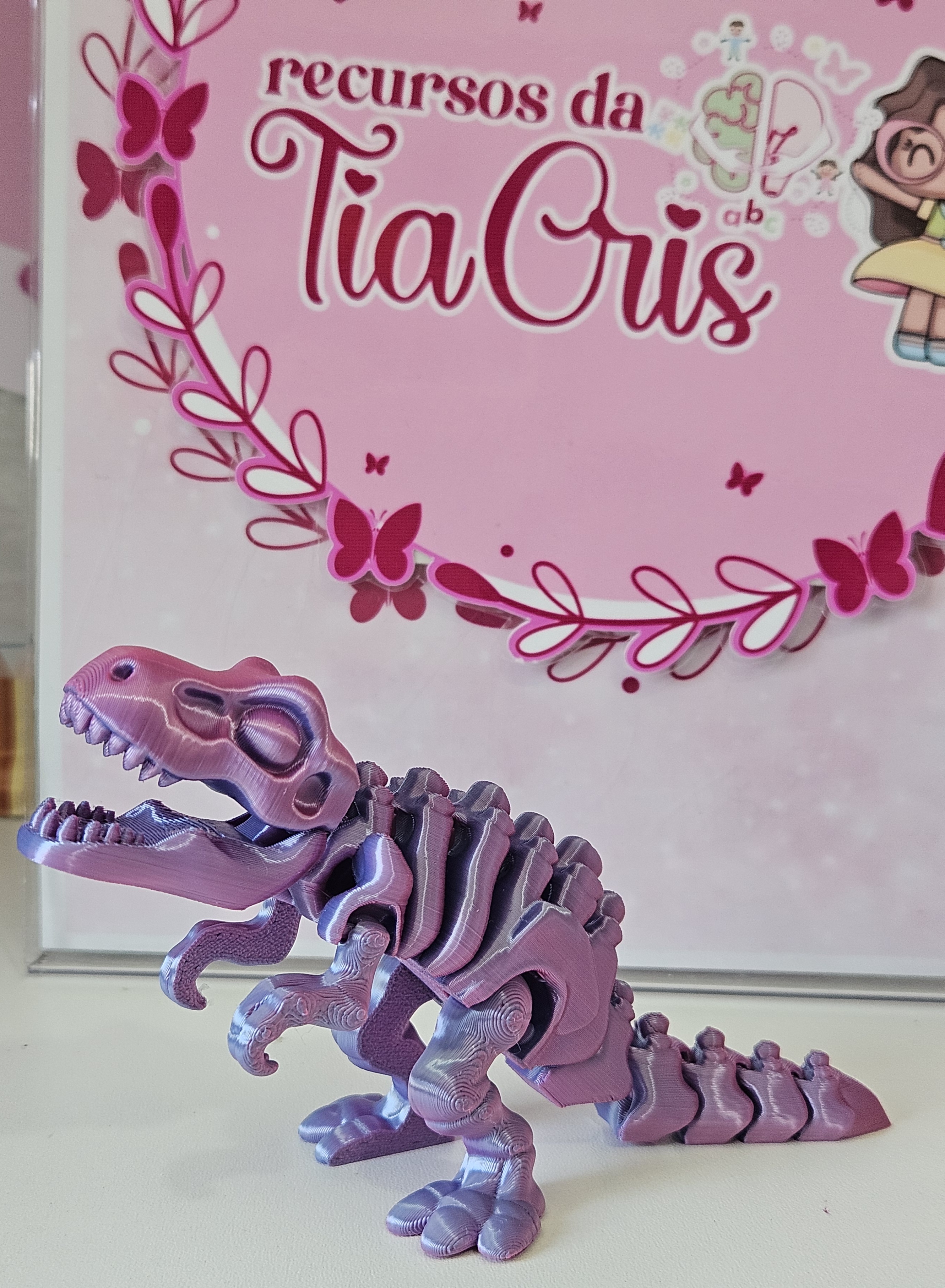 Tiranossauro articulado lilás, foto 1